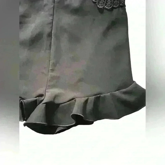 Black Romper Embroidered floral design , ruffle hem, zip up adjustable straps - Picture 5 of 13